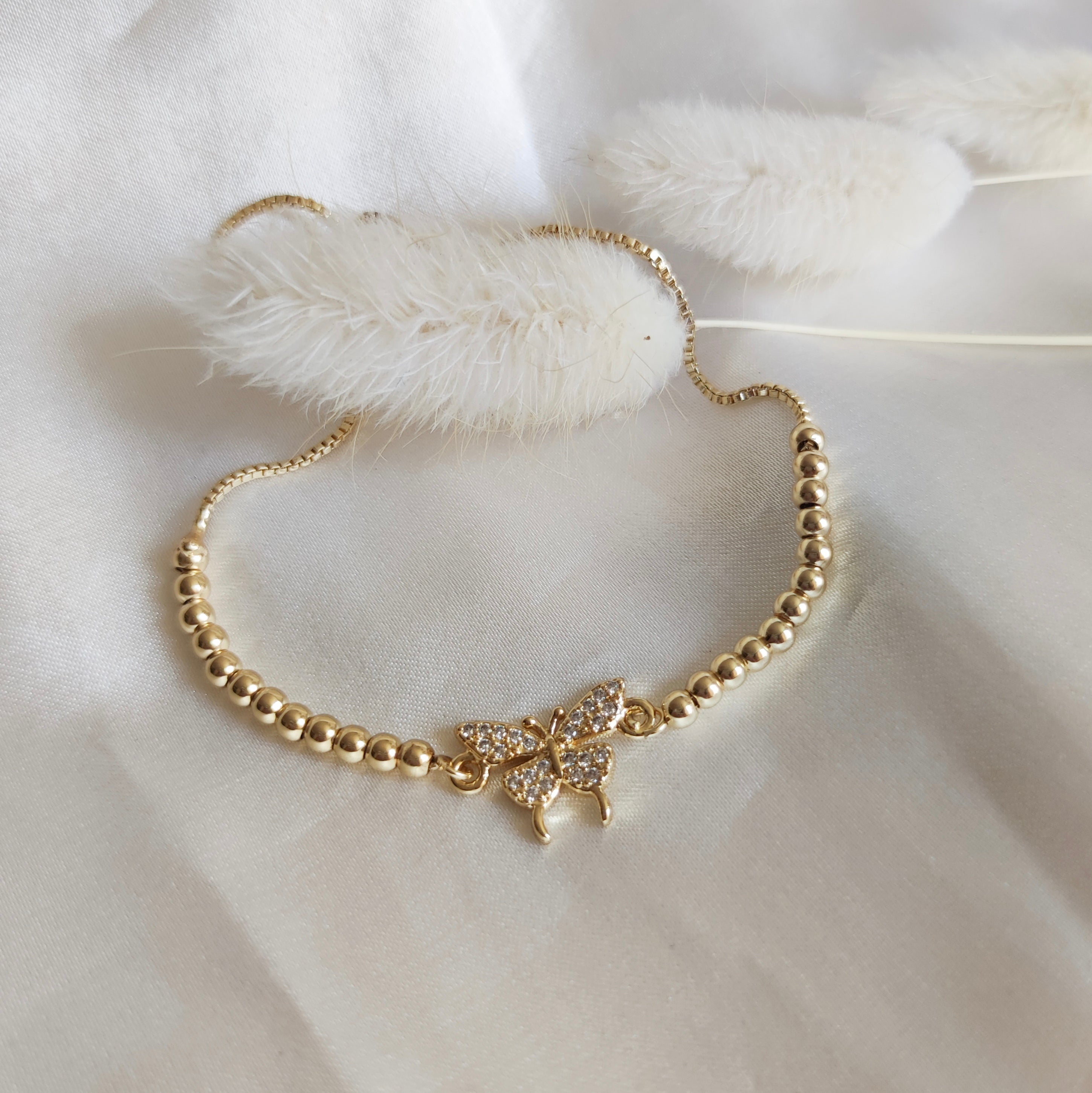 Pulsera bolitas Mariposa